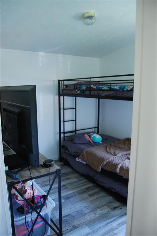 4053 Pioneer Lake Road Cherry Tree, PA 15724 - Photo 15 of 20 a bedroom with a bed and a chair