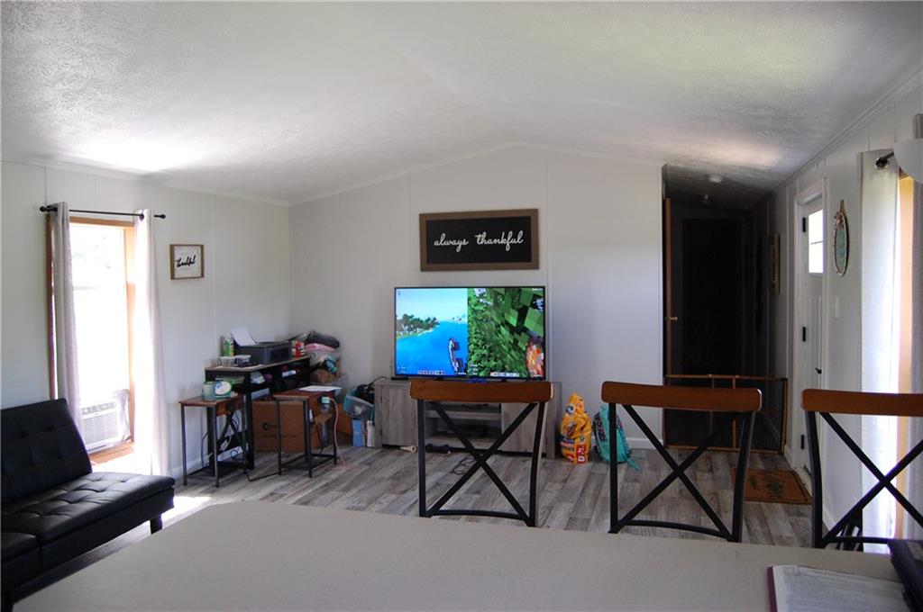 4053 Pioneer Lake Road Cherry Tree, PA 15724 - Photo 3 of 20 a view of a workspace with furniture and a window