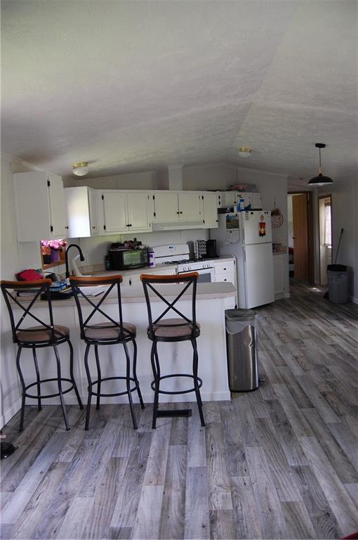 4053 Pioneer Lake Road Cherry Tree, PA 15724 - Photo 5 of 20 a room with furniture and wooden floor