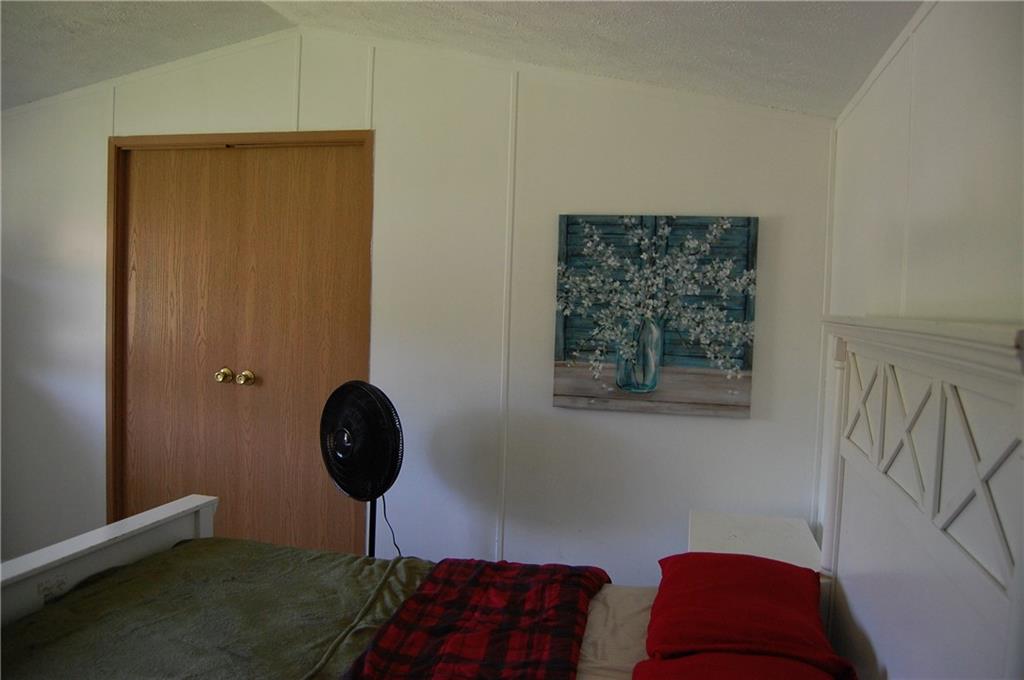 4053 Pioneer Lake Road Cherry Tree, PA 15724 - Photo 9 of 20 a view of a livingroom with a window