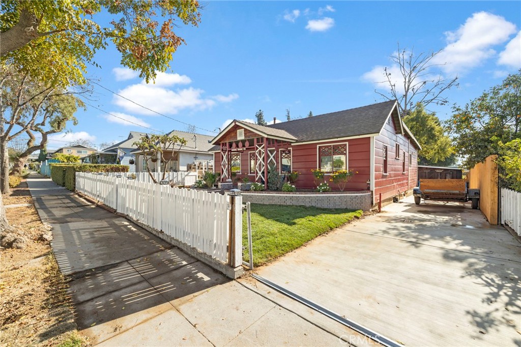 12428 Pasadena Street Whittier, CA 90601 - Photo 2 of 25 a view of a house with yard and balcony
