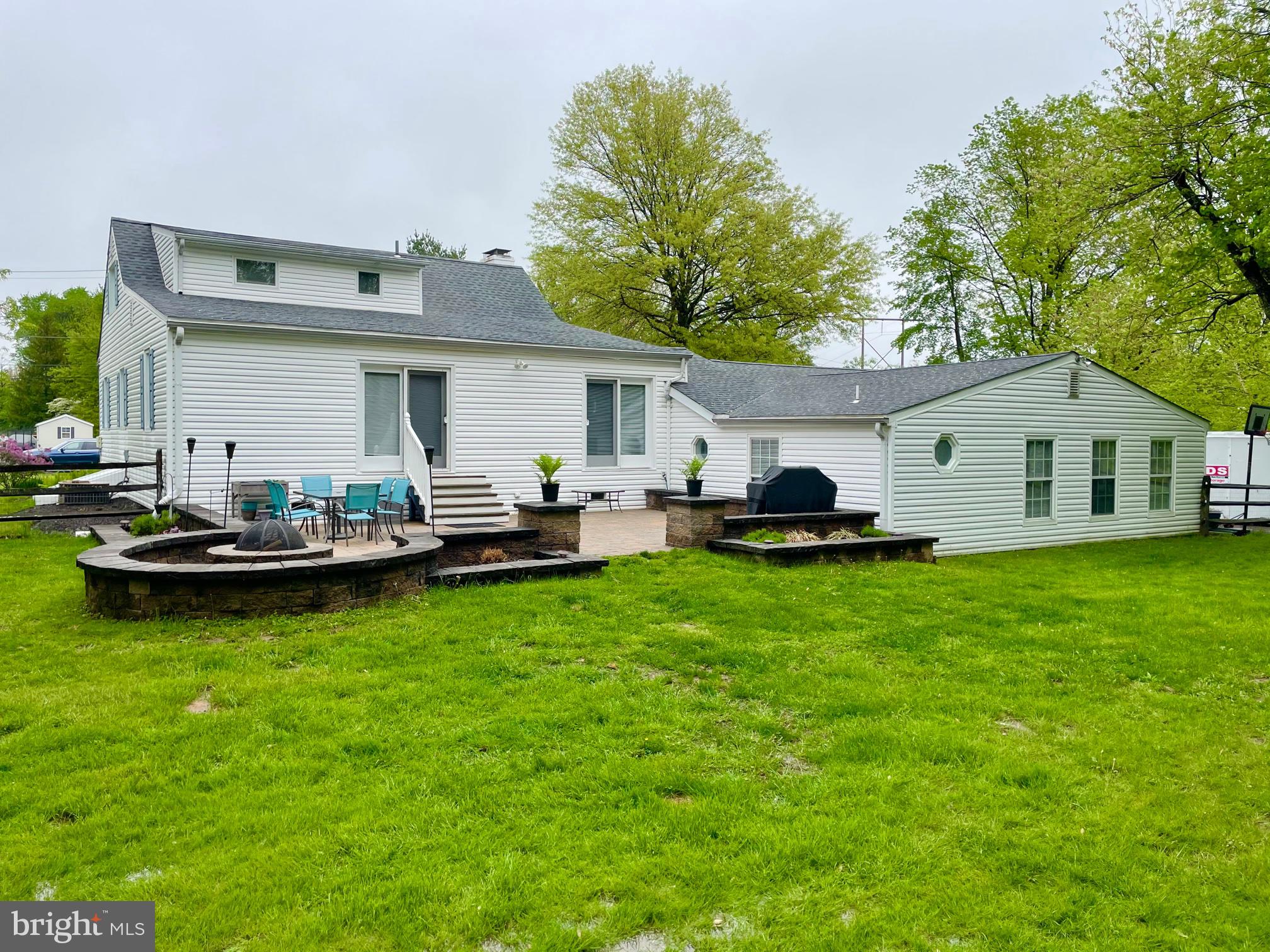 2112 Longview Road Warrington, PA 18976 - Photo 56 of 79 Rear of home with paved patio and firepit.