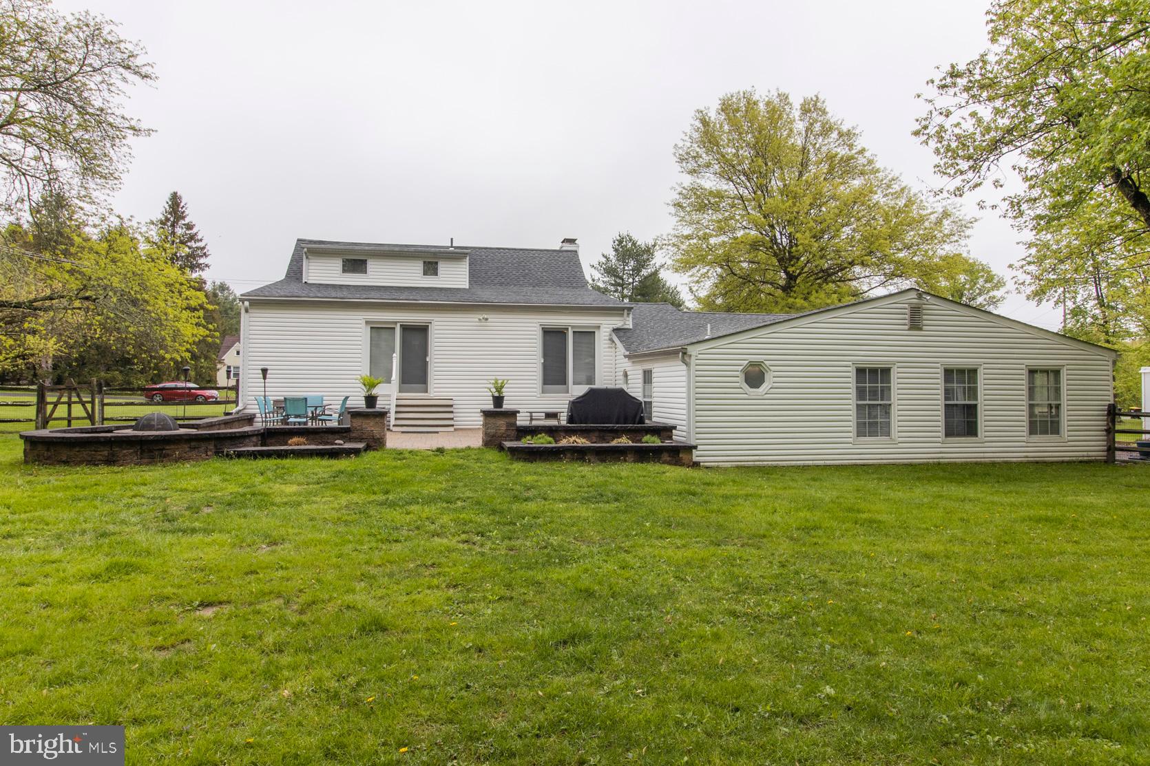 2112 Longview Road Warrington, PA 18976 - Photo 59 of 79 Rear of home with paved patio and firepit.