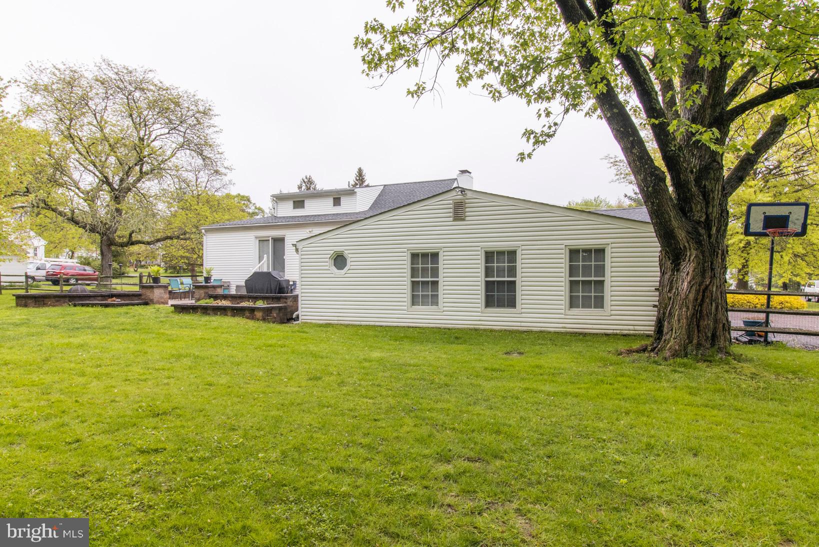 2112 Longview Road Warrington, PA 18976 - Photo 60 of 79 Rear of home with paved patio and firepit.