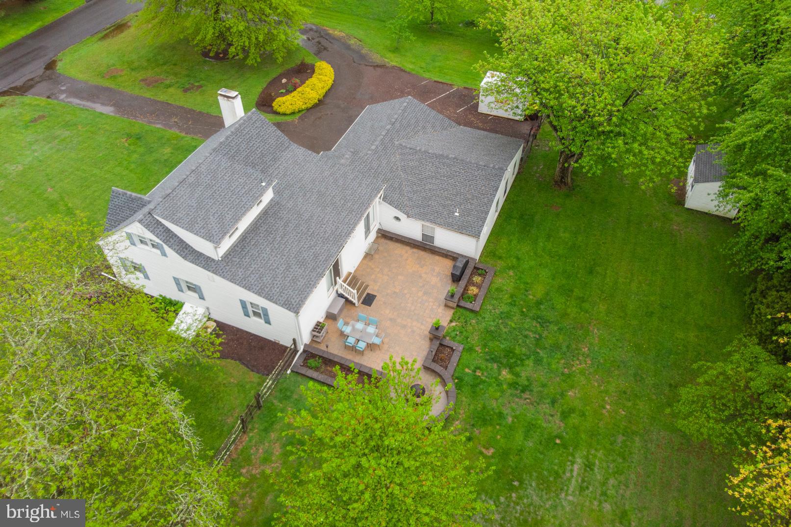 2112 Longview Road Warrington, PA 18976 - Photo 79 of 79 Drone photo of property showing rear paved patio.