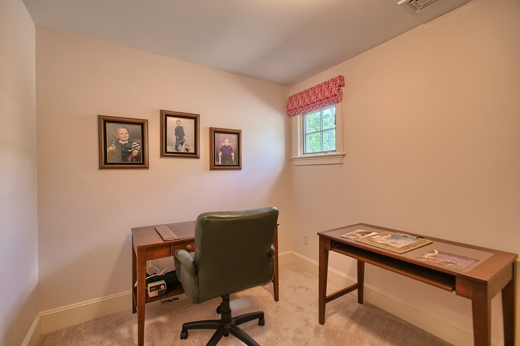 96 Forest Ridge Road, Unit 96 Concord, MA 01742 - Photo 18 of 24 a view of a workspace with furniture
