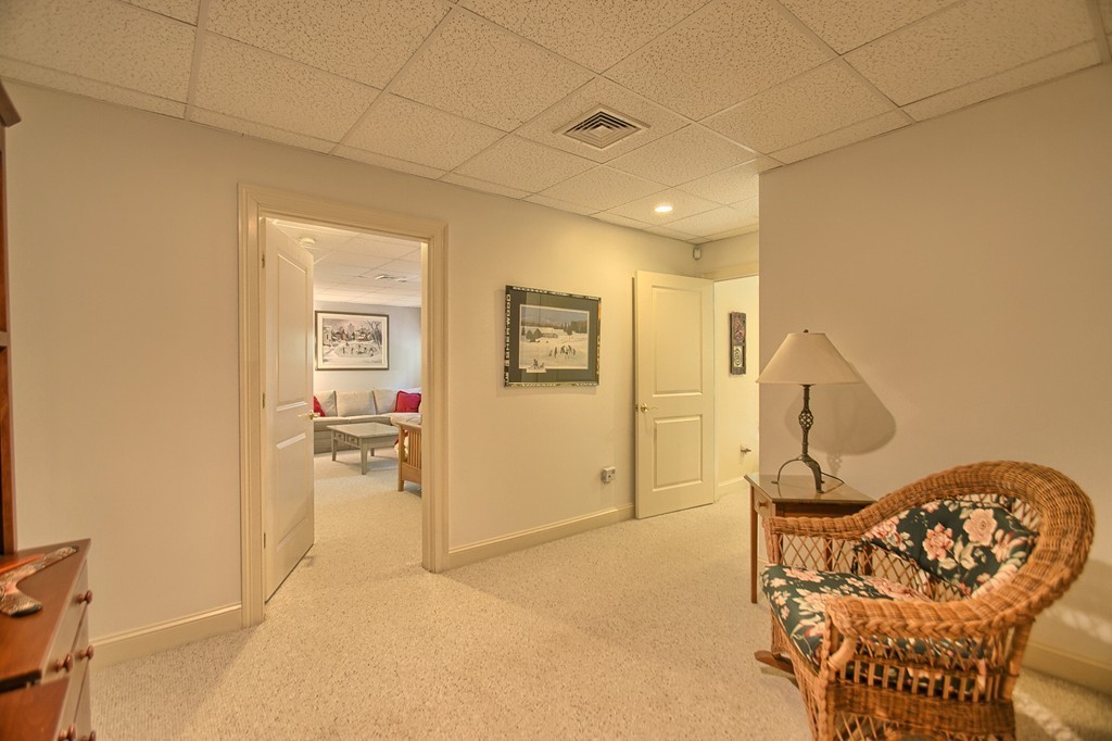 96 Forest Ridge Road, Unit 96 Concord, MA 01742 - Photo 19 of 24 a view of a livingroom with furniture