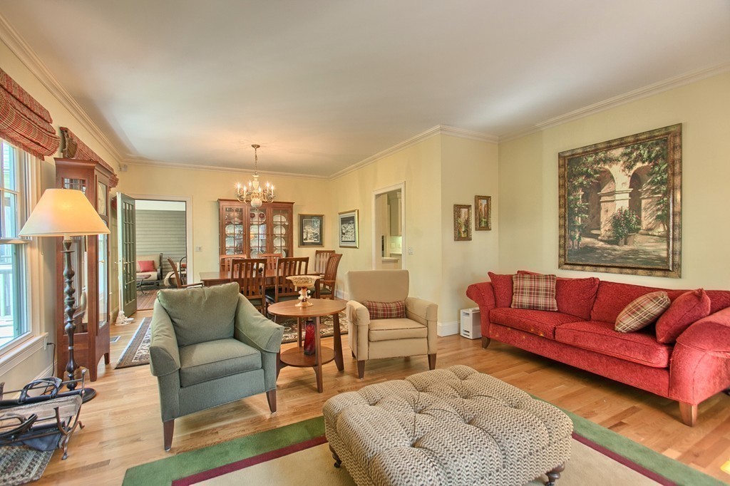 96 Forest Ridge Road, Unit 96 Concord, MA 01742 - Photo 8 of 24 a living room with furniture and a couch