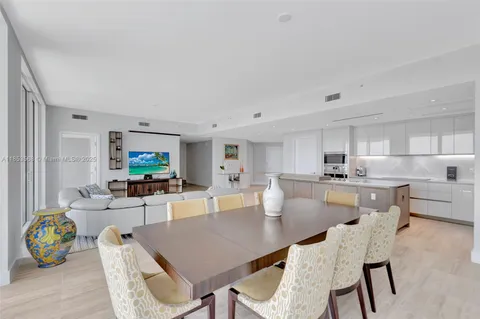 a view of kitchen dining table and chairs