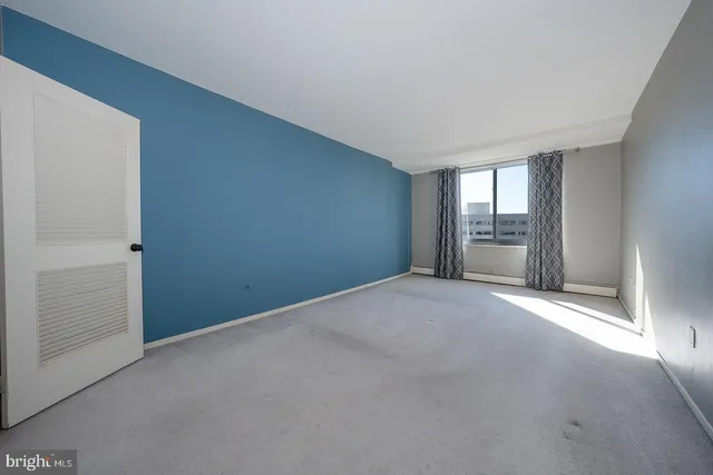 an empty room with windows