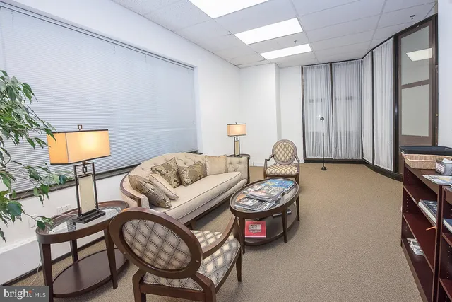 a sign broad on a white wall