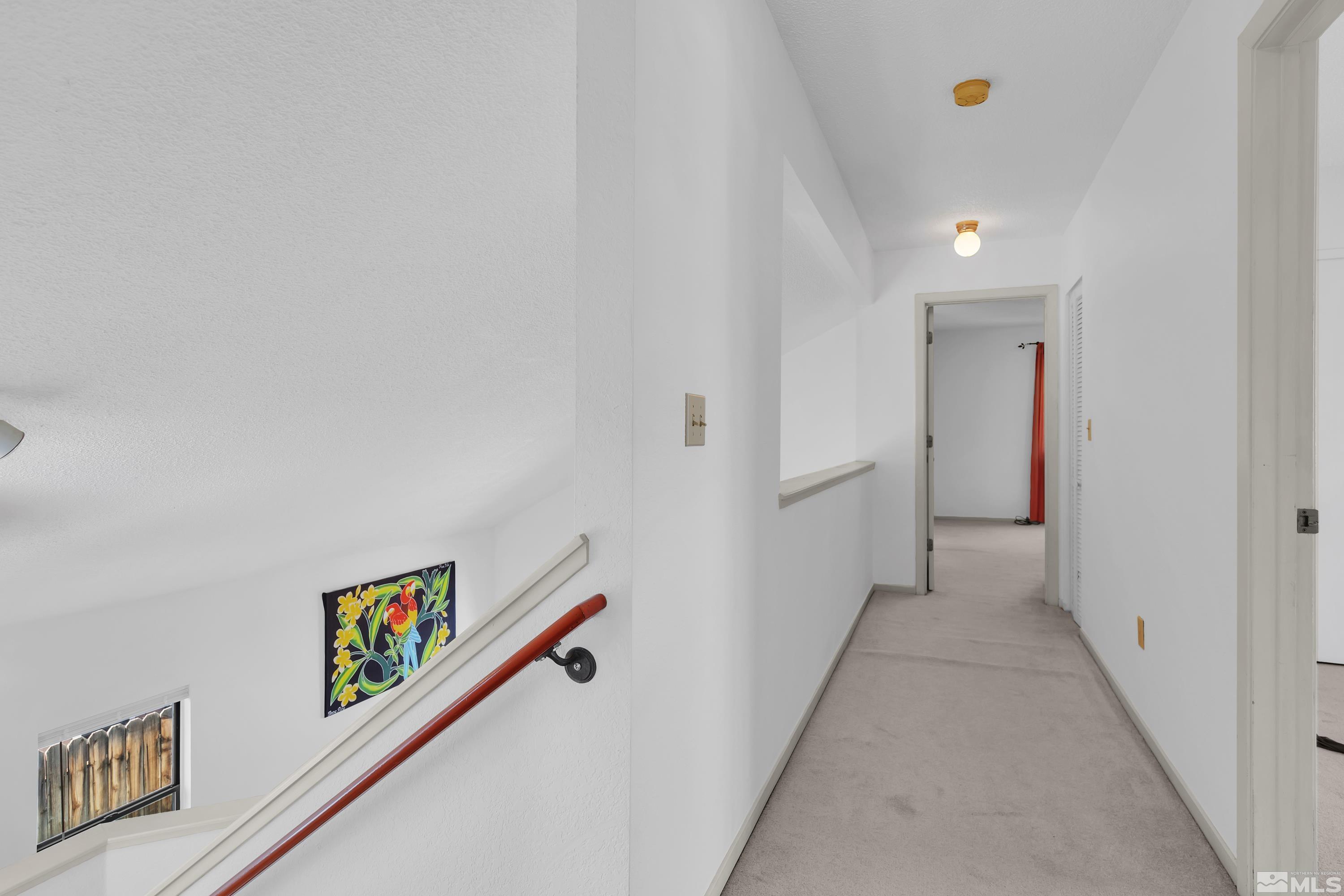 1791 Grand Point Way Reno, NV 89523 - Photo 17 of 24 a view of a hallway with closet