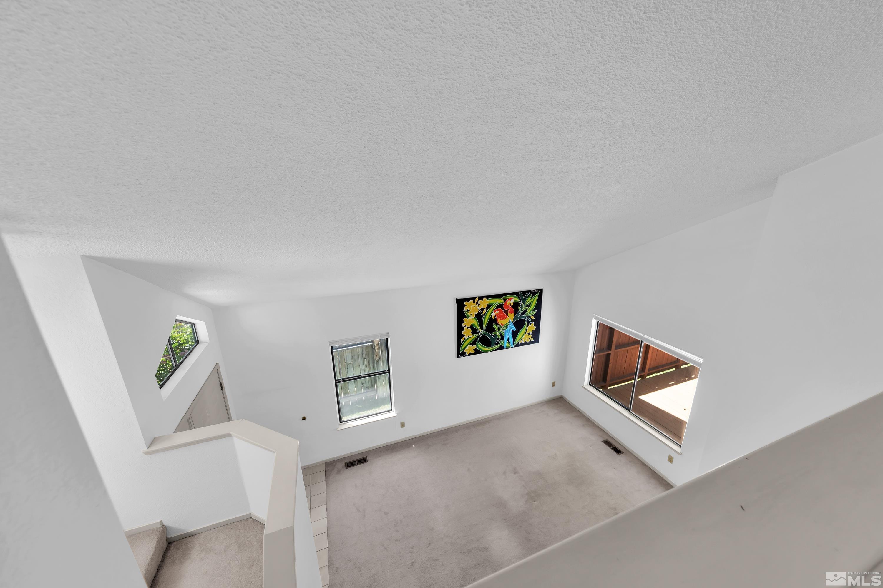 1791 Grand Point Way Reno, NV 89523 - Photo 18 of 24 a view of a livingroom with wooden floor and furniture