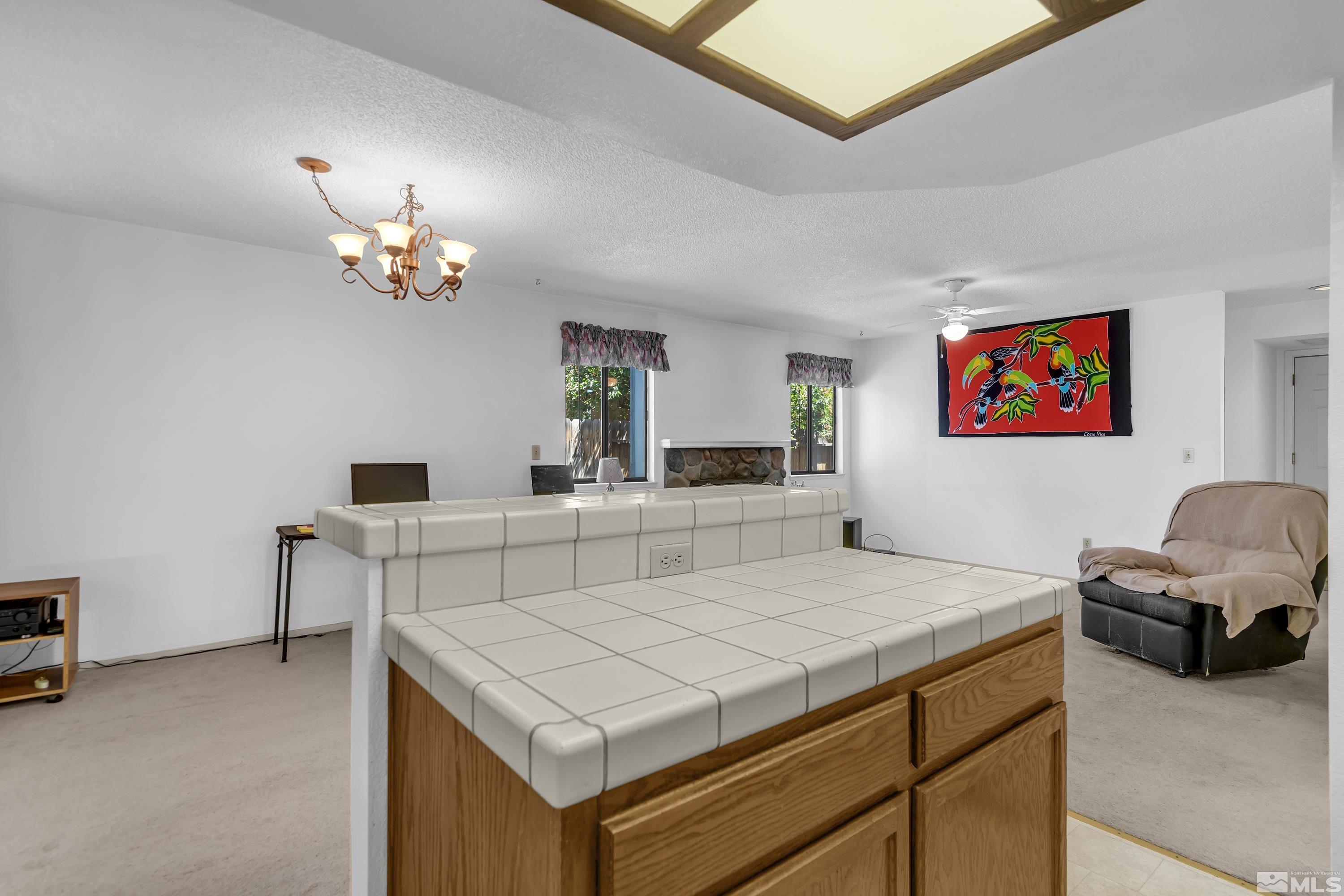 1791 Grand Point Way Reno, NV 89523 - Photo 8 of 24 a living room with furniture and a table