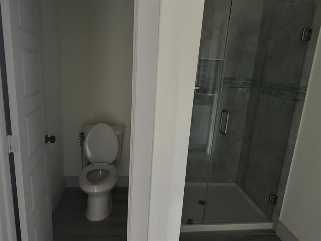 6043 Rivendell Drive Frisco, TX 75035 - Photo 13 of 21 a bathroom with a toilet and a sink