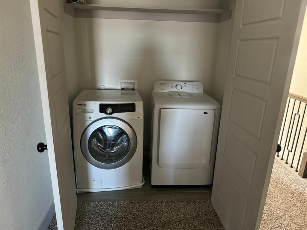 6043 Rivendell Drive Frisco, TX 75035 - Photo 17 of 21 a utility room with dryer and washer