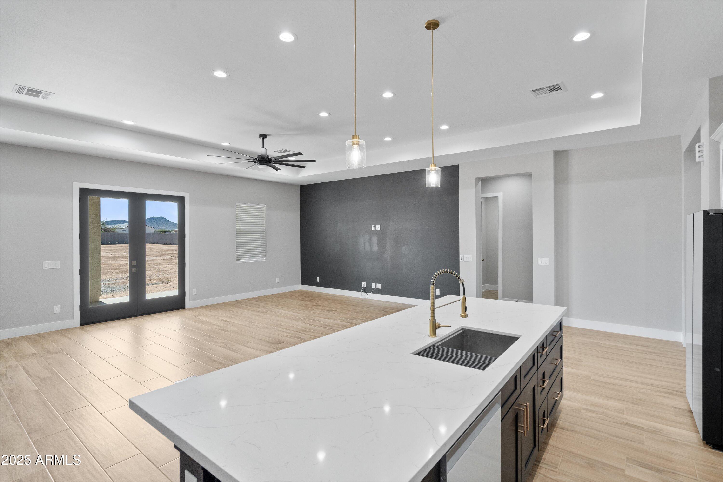 20765 West Cheyenne Road Buckeye, AZ 85326 - Photo 11 of 54 11-Kitchen to Family
