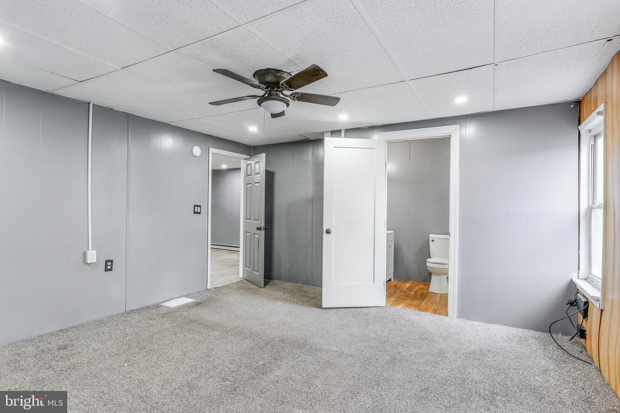212 Beaver Road, Unit 1 Harrisburg, PA 17112 - Photo 6 of 11 a view of an empty room and a bathroom