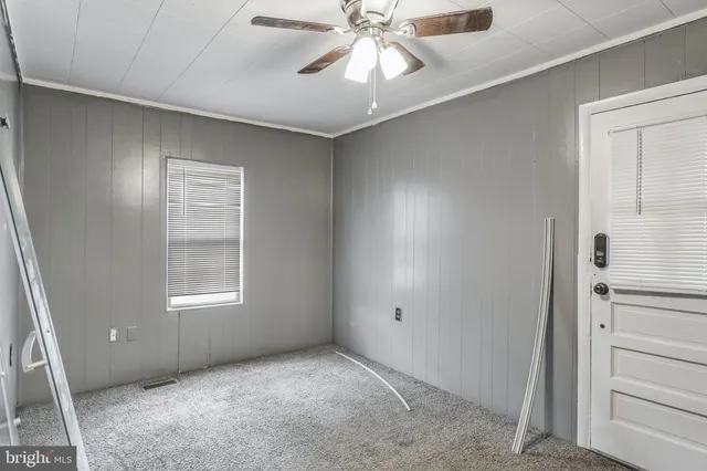 a view of balcony with wooden floor