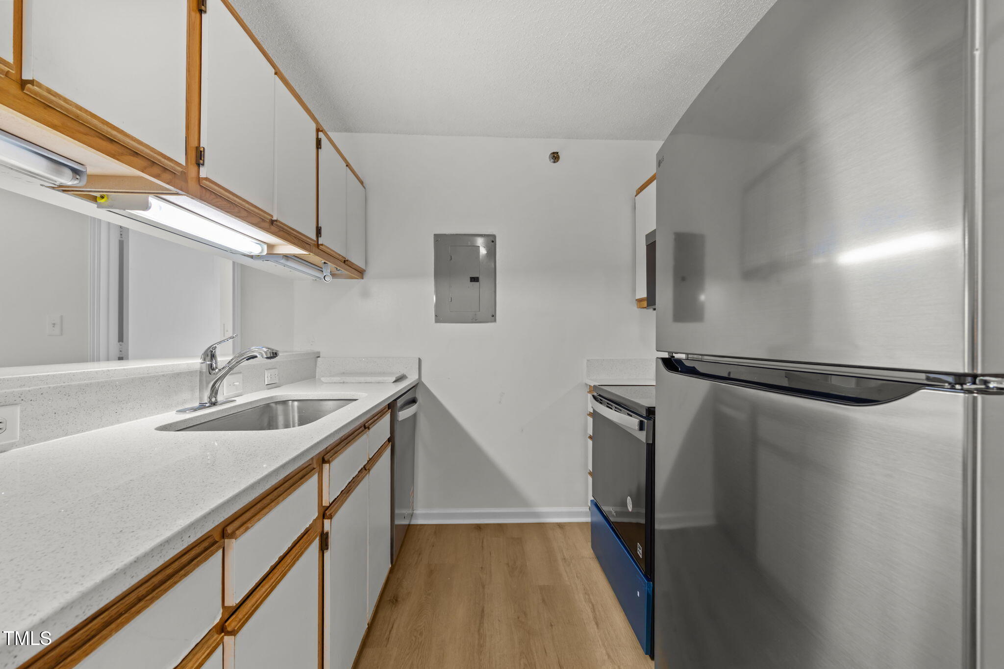 1521 Graduate Lane, Unit 302 Raleigh, NC 27606 - Photo 10 of 21 Kitchen with New Stainless Appliances
