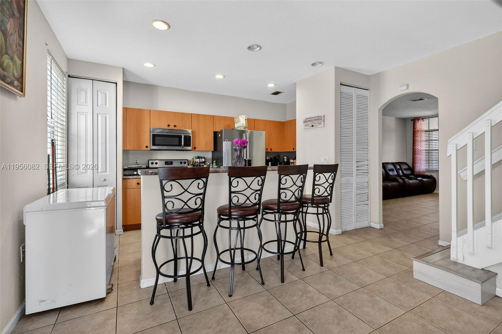 2671 Southwest 85th Terrace, Unit 103 Miramar, FL 33025 - Photo 14 of 49 a view of a dining room with furniture