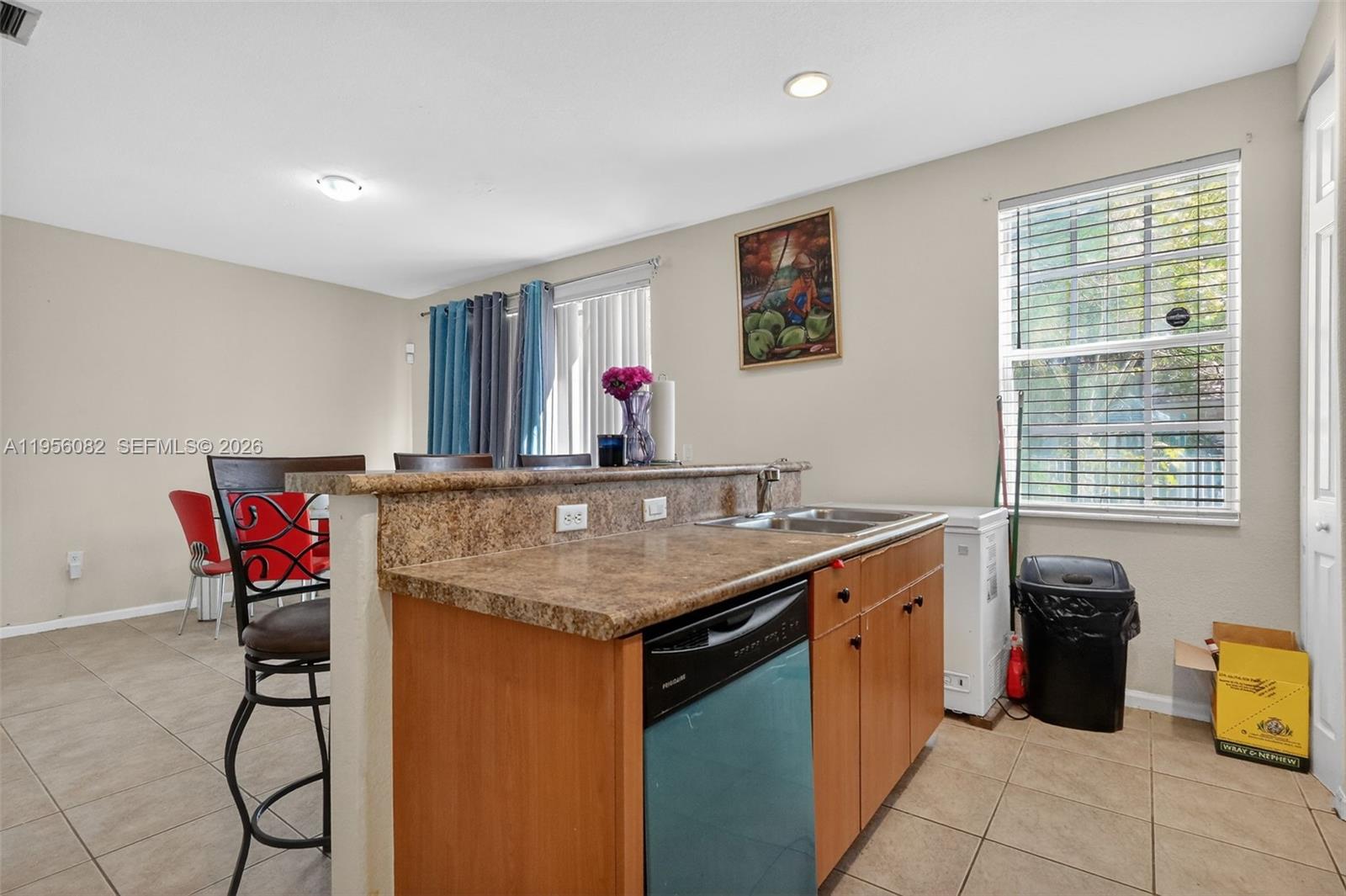 2671 Southwest 85th Terrace, Unit 103 Miramar, FL 33025 - Photo 17 of 49 a room with furniture and window