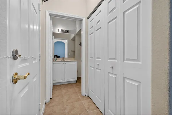 a view of a hallway view with staircase