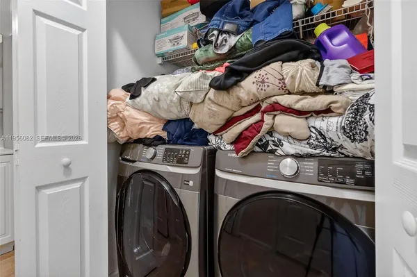 a utility room with dryer and washer