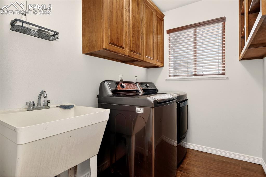 7763 Middle Bay Way Fountain, CO 80817 - Photo 16 of 44 a utility room with dryer and washer