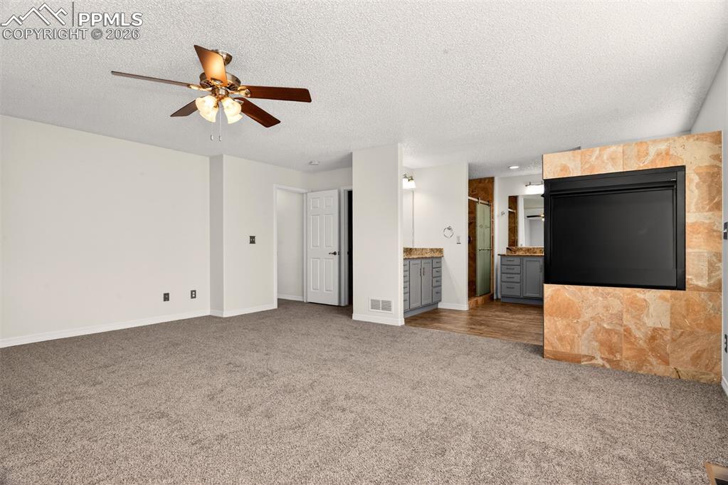 7763 Middle Bay Way Fountain, CO 80817 - Photo 19 of 44 a view of an empty room with a flat screen tv