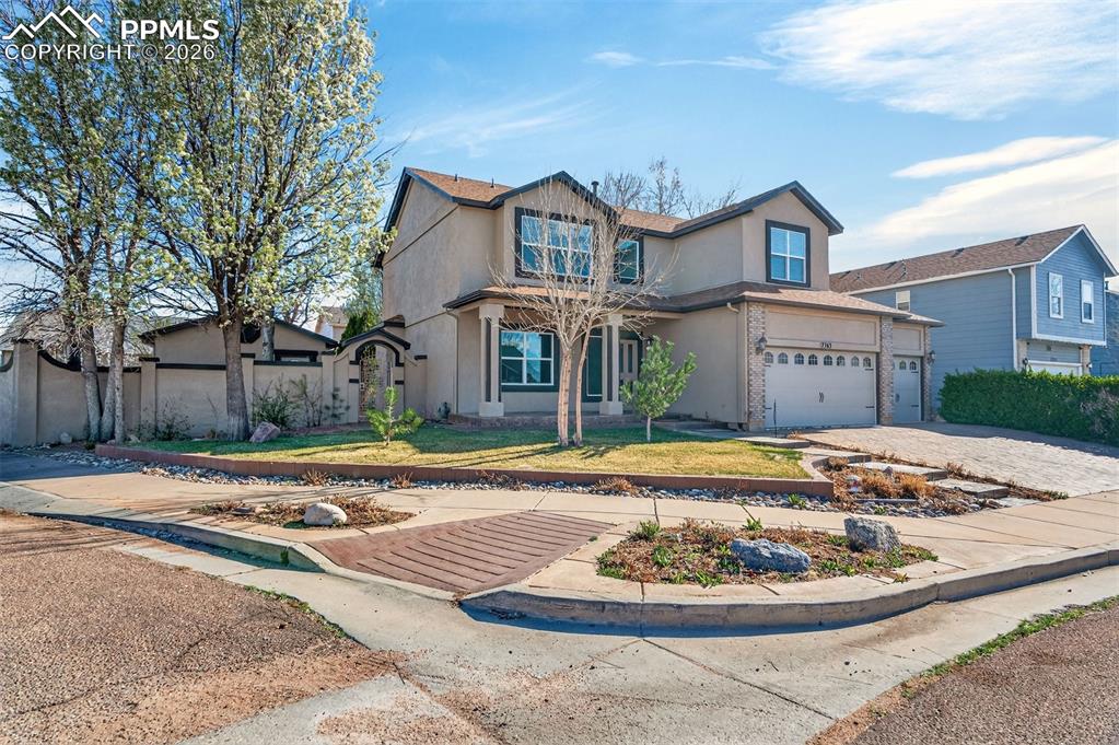 7763 Middle Bay Way Fountain, CO 80817 - Photo 3 of 44 a front view of a house with a yard