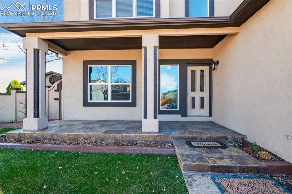 7763 Middle Bay Way Fountain, CO 80817 - Photo 4 of 44 a front view of a house with a yard