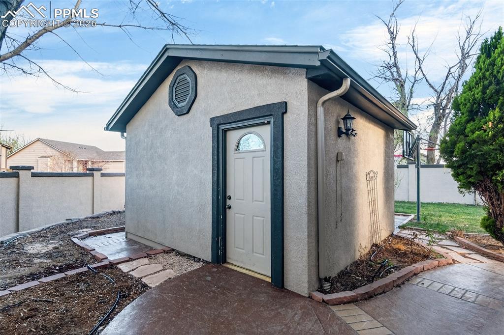 7763 Middle Bay Way Fountain, CO 80817 - Photo 44 of 44 a front view of a house with garden