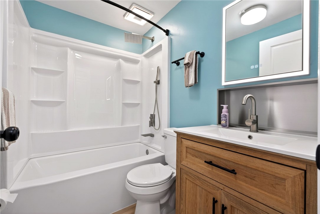 5975 Rosalie Road Dayton, OH 45424 - Photo 15 of 48 This clean and inviting bathroom features a convenient shower and tub combination.