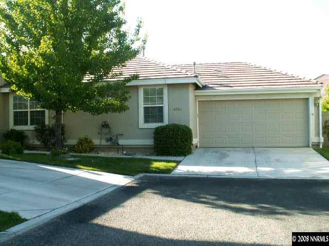 9709 Ripple Way Reno, NV 89521 - Photo 1 of 9 a view of a house with a yard and plants