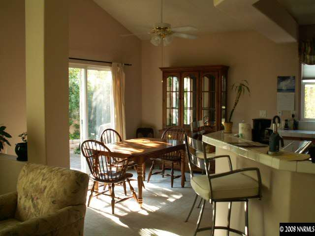 9709 Ripple Way Reno, NV 89521 - Photo 3 of 9 a view of a livingroom and dining room