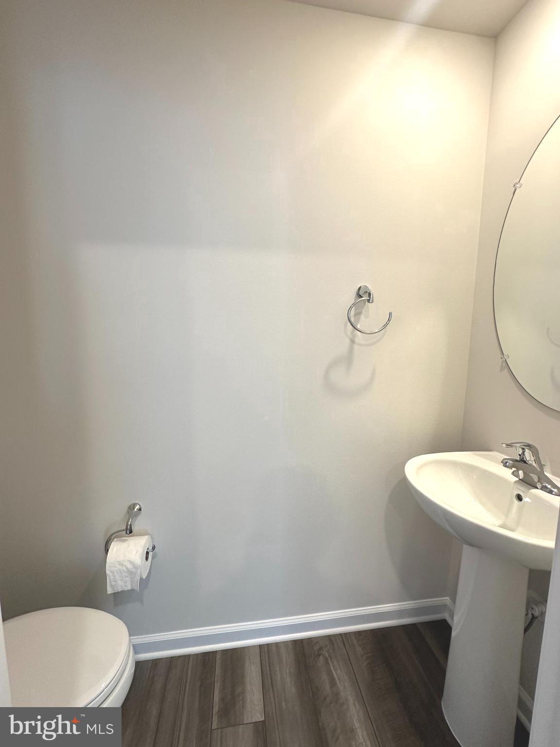 78 Rolling Branch Drive Ranson, WV 25438 - Photo 27 of 49 a bathroom with a sink a toilet and a mirror