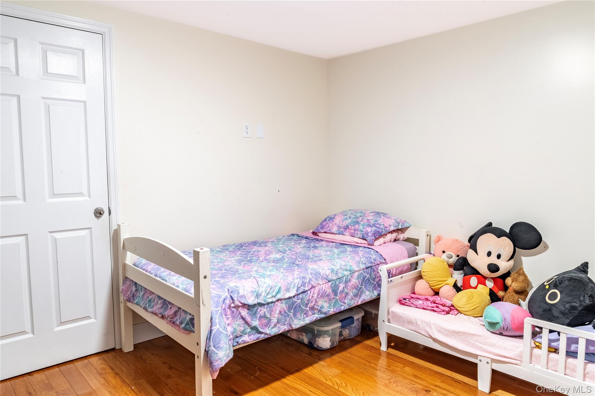 283 Chestnut Street Liberty, NY 12754 - Photo 14 of 22 a bedroom with a bed and a dresser in it