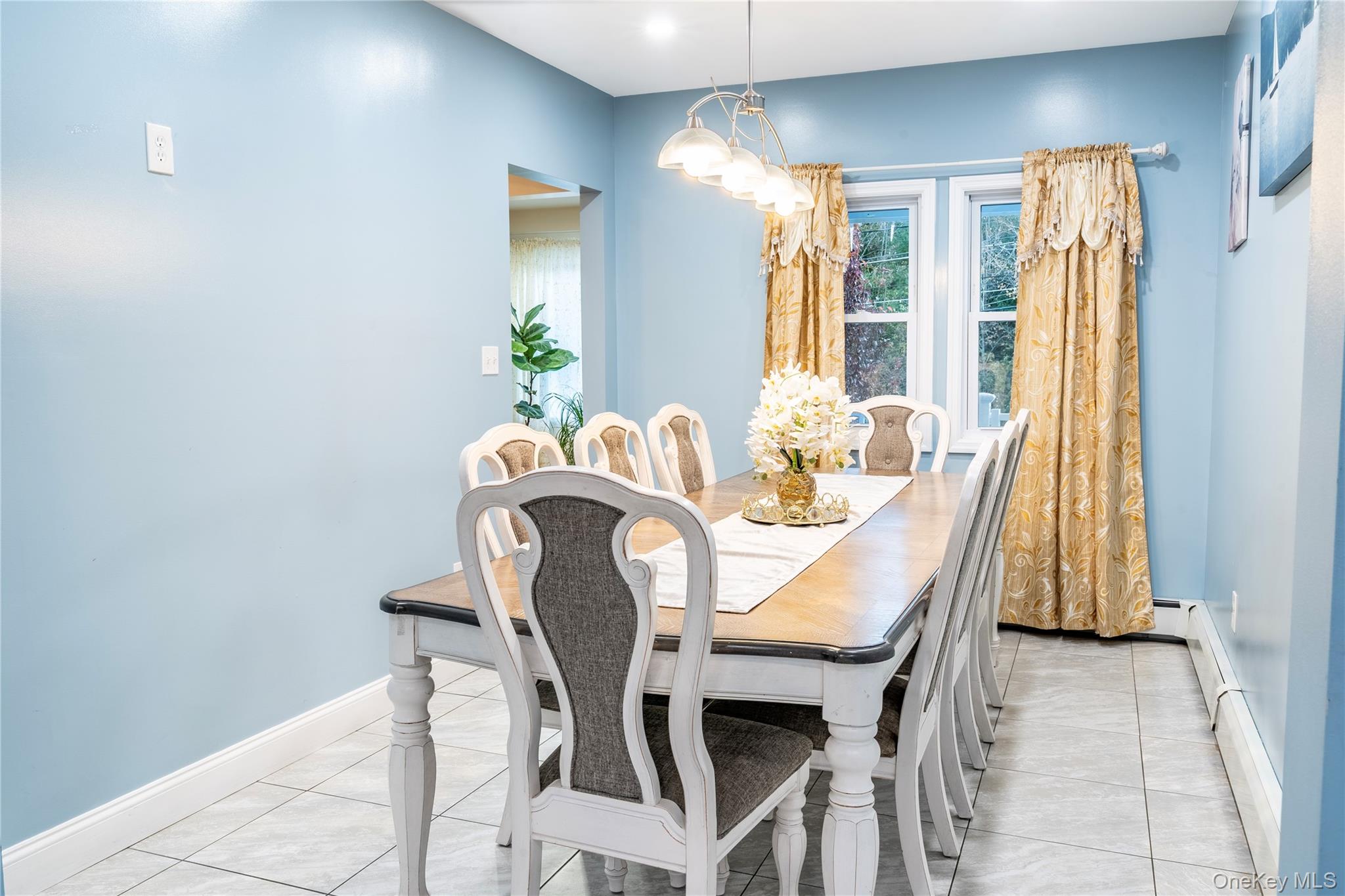 283 Chestnut Street Liberty, NY 12754 - Photo 5 of 22 a view of a dining room with furniture and a window