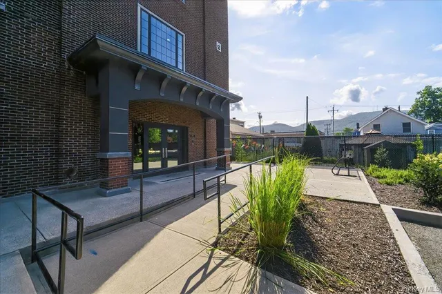 a view of outdoor kitchen and patio