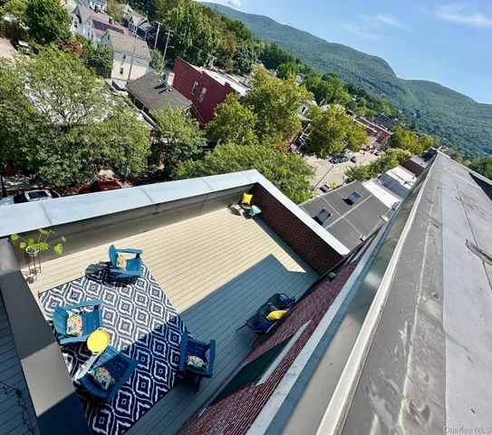 a view of a outdoor sitting area with furniture