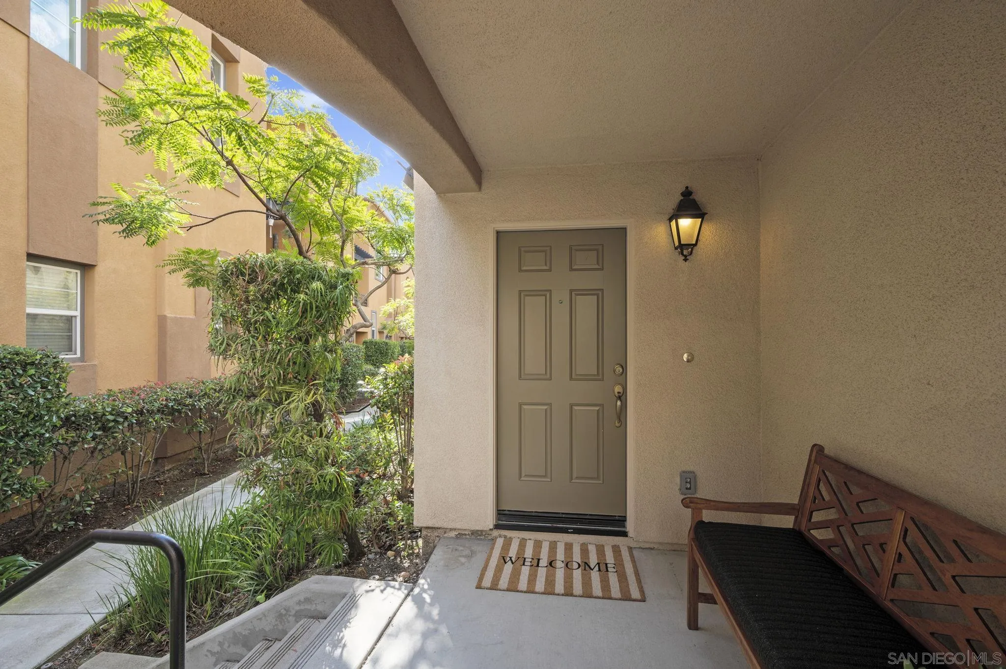 2847 Escala Circle San Diego, CA 92108 - Photo 2 of 35 a view of a balcony with wooden floor and chair