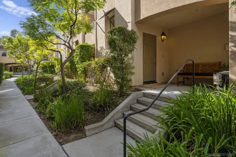 a view of a balcony with chairs