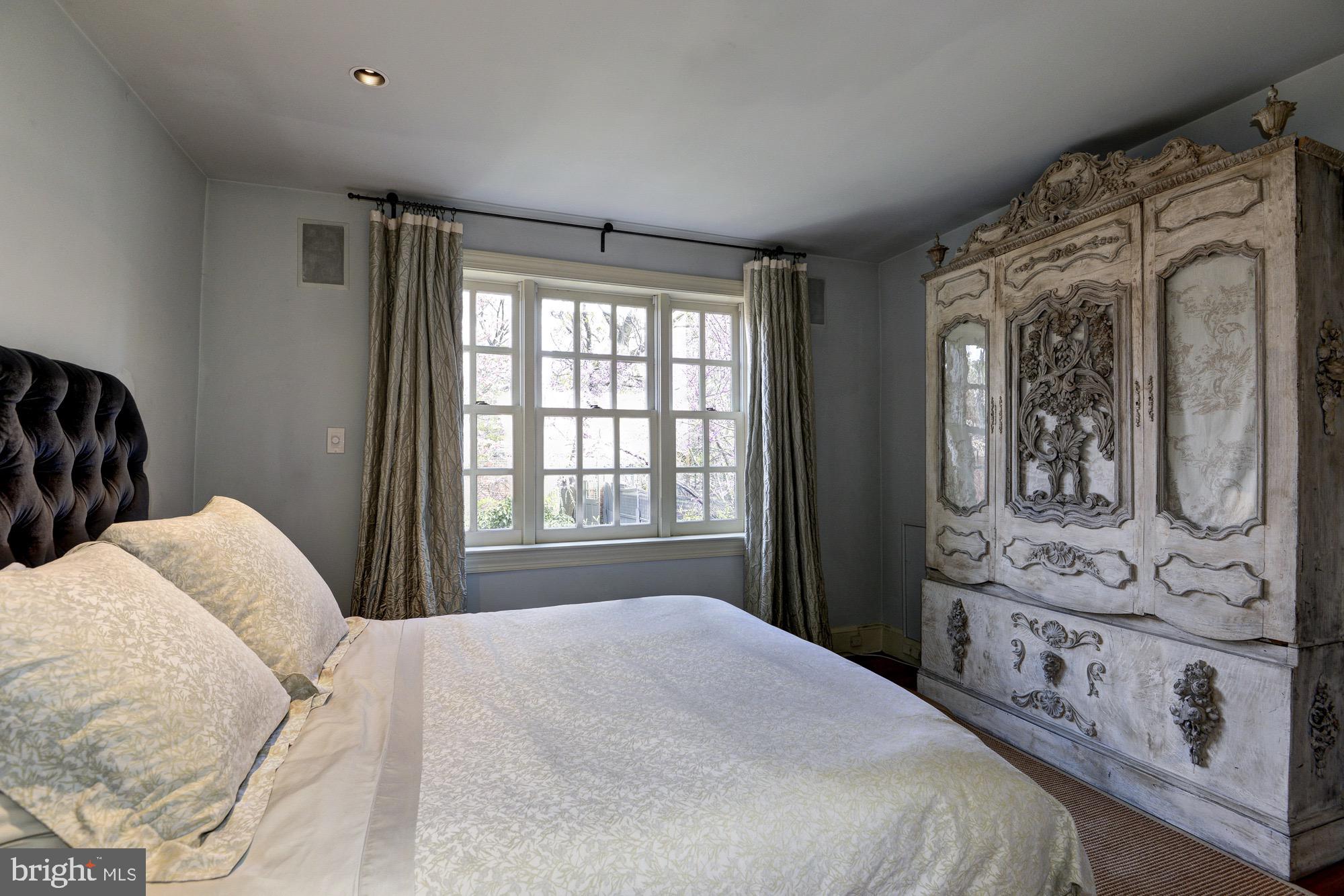 3249 O Street Northwest Washington, DC 20007 - Photo 11 of 24 a bedroom with a bed and a dresser