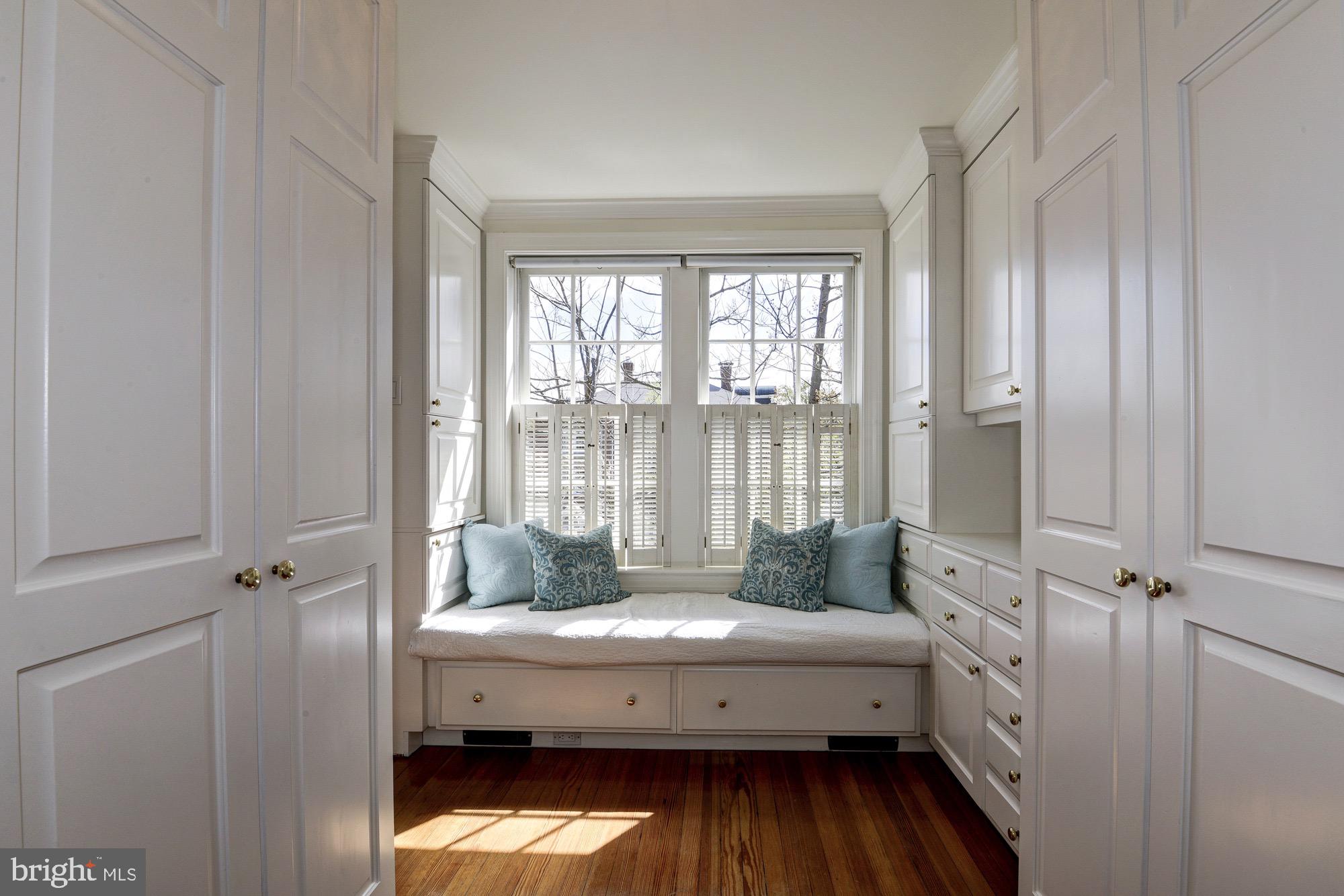 3249 O Street Northwest Washington, DC 20007 - Photo 15 of 24 a spacious bedroom with a bed and a window