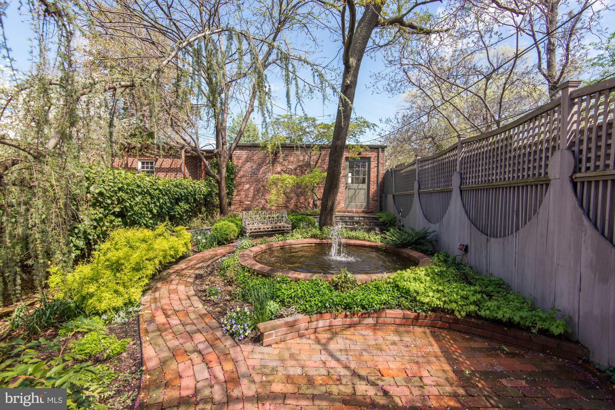 3249 O Street Northwest Washington, DC 20007 - Photo 16 of 24 a view of a garden with a pathway