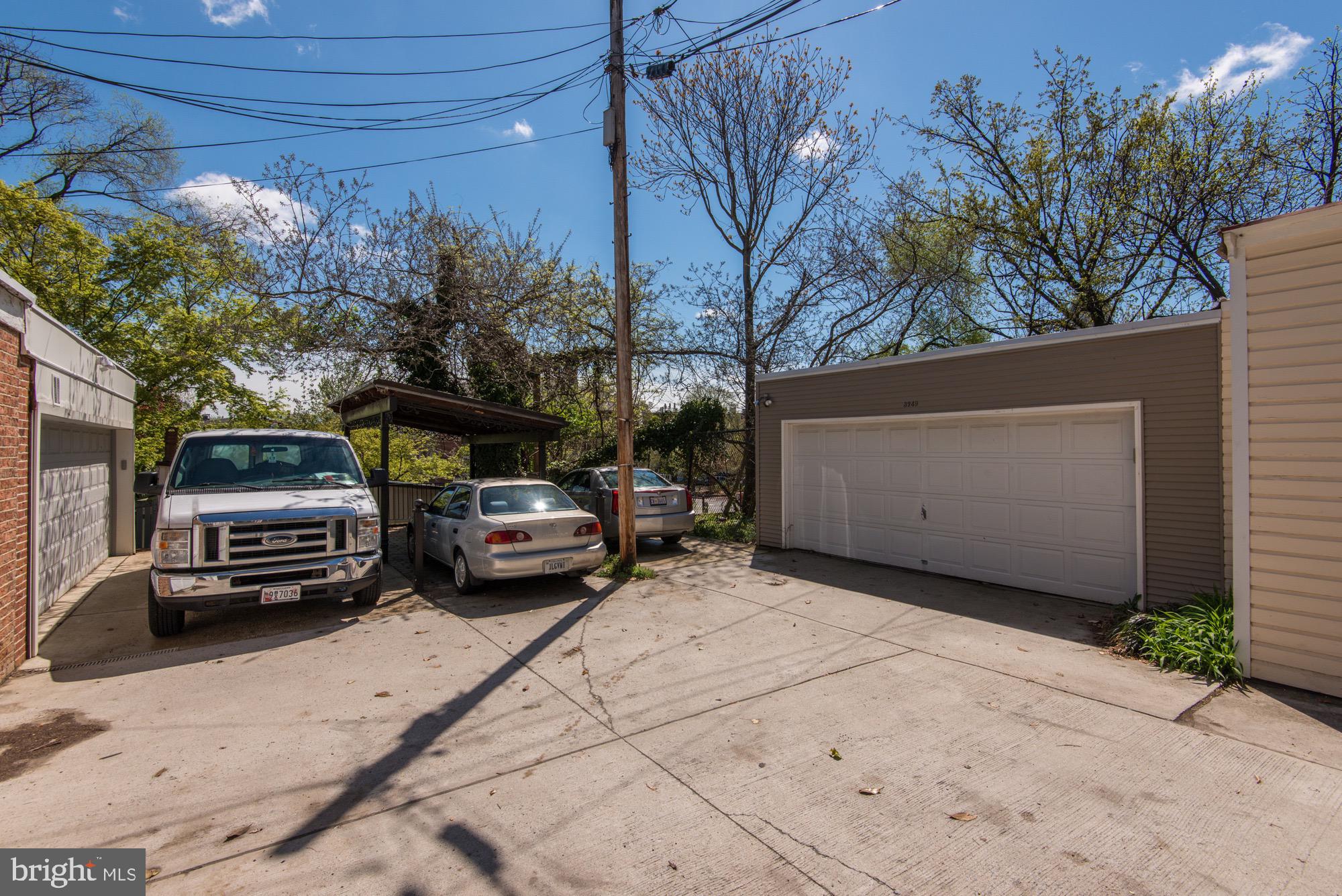 3249 O Street Northwest Washington, DC 20007 - Photo 23 of 24 a view of a car parked in front of a house