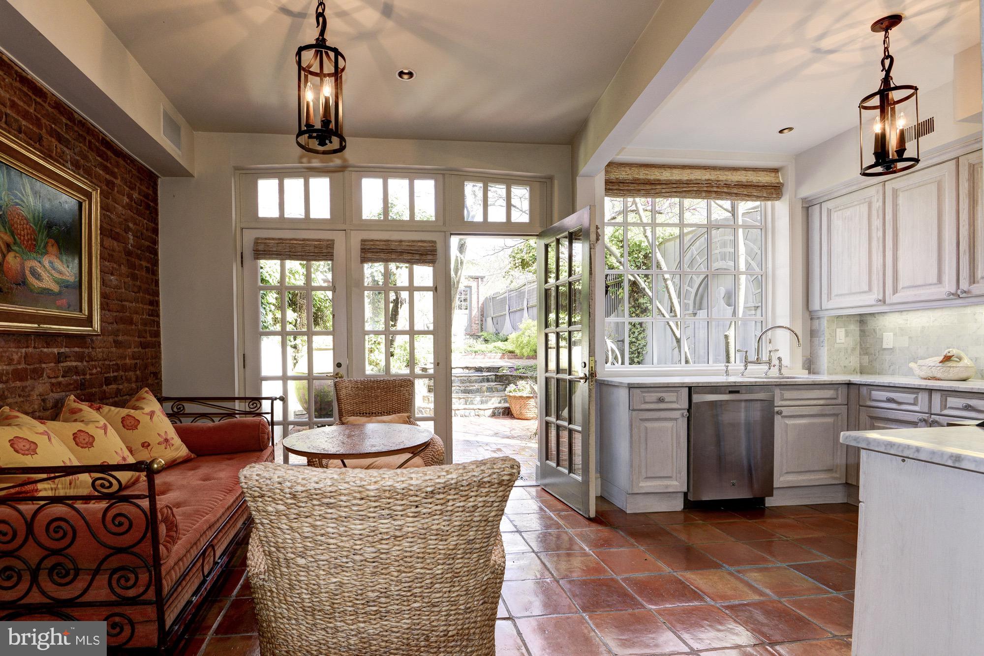 3249 O Street Northwest Washington, DC 20007 - Photo 7 of 24 a living room with furniture and large windows