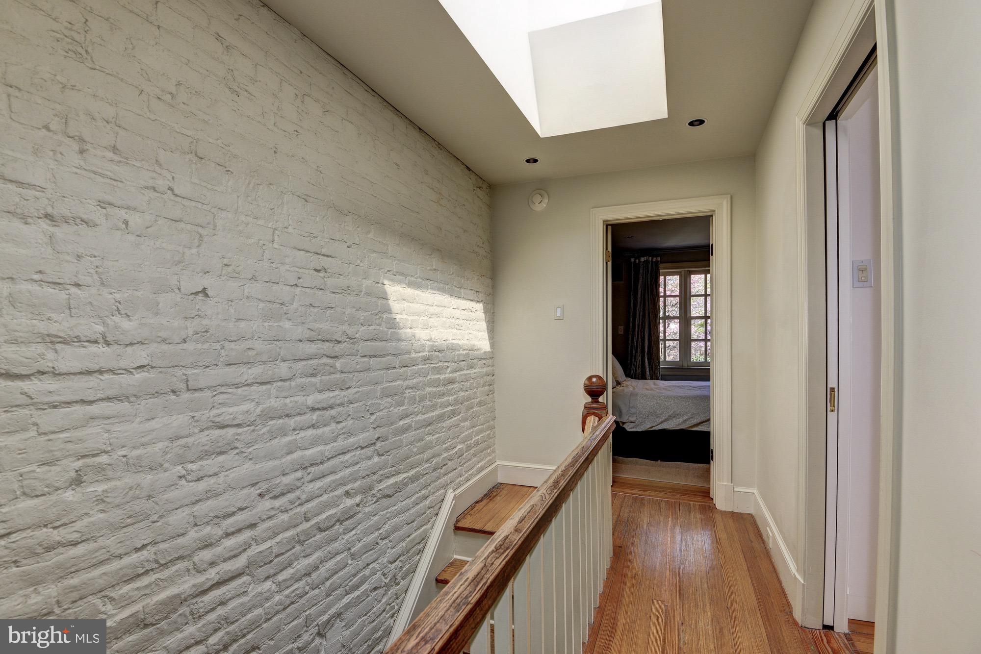 3249 O Street Northwest Washington, DC 20007 - Photo 9 of 24 a view of hallway with wooden floor