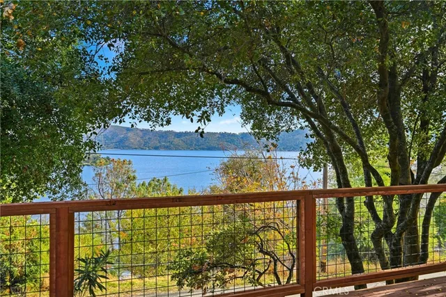 a view of a balcony with a pot